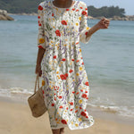 Cristina - Robe longue à col rond et imprimé floral